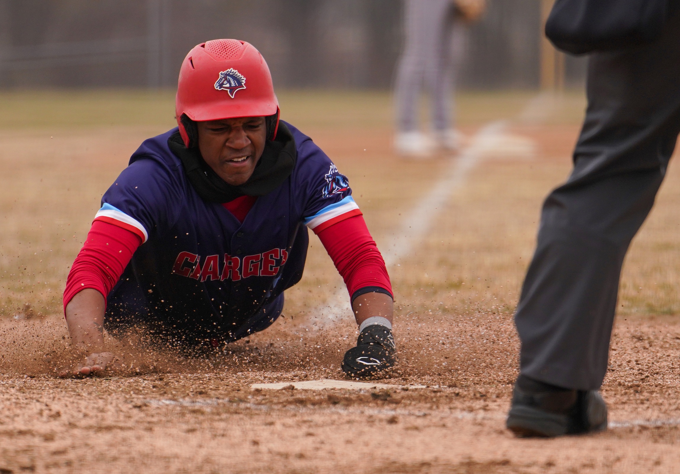 Jaden Coleman steals home in Wednesday's game against Illinois Central.